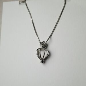 Potion-shaped Cage Pendant